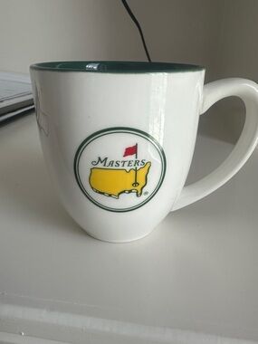 Masters White Coffee Mug with Green Rim and Yellow Logo